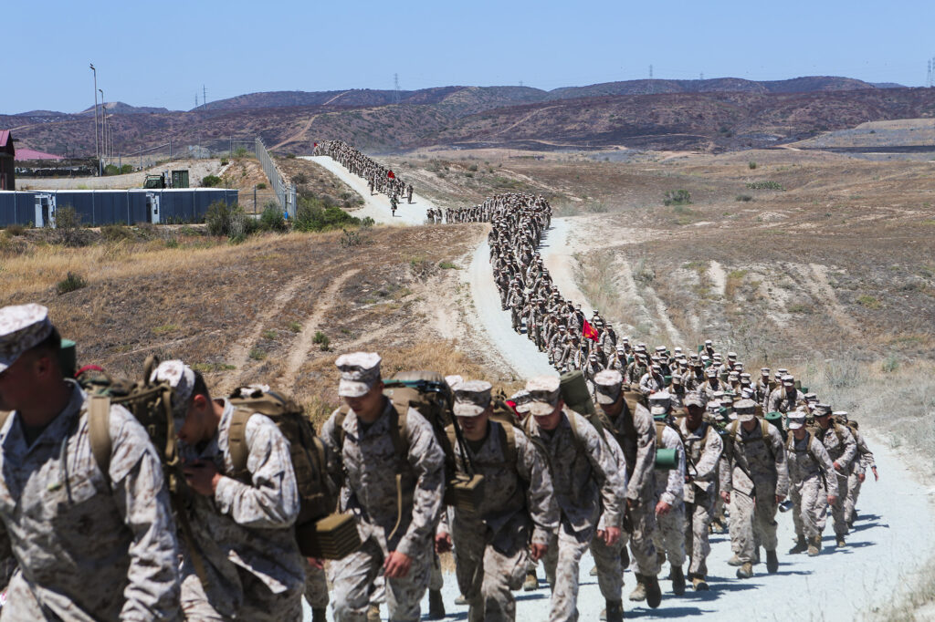 Marines with 1st Light Armored Reconnaissance Battalion, 1st Marine Division, I Marine Expeditionary Force hike nearly 5 miles from Camp Las Flores to Red Beach aboard Camp Pendleton, Calif., June 5, 2014.  Camp Pendleton Military Divorce Attorneys at Ryan Family Law