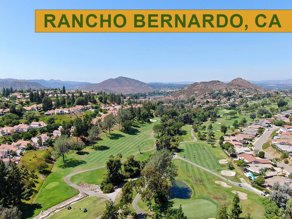 Aerial view of residential neighborhood surrounded by golf in green valley, Rancho Bernardo, San Diego County, California. USA.